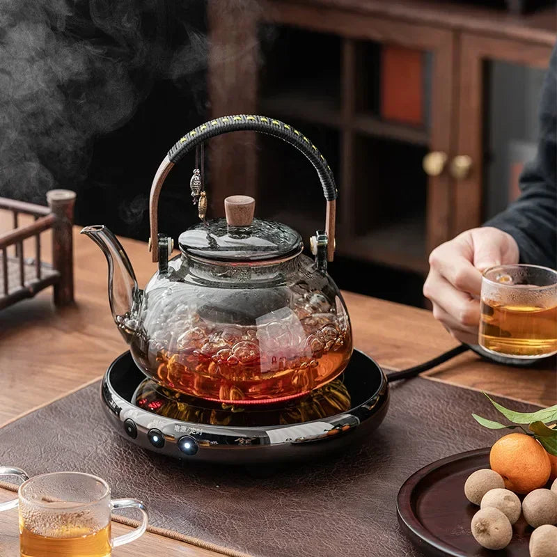 Small Glass Kettle Tea Set with Steaming Teapot and Electric Clay Stove