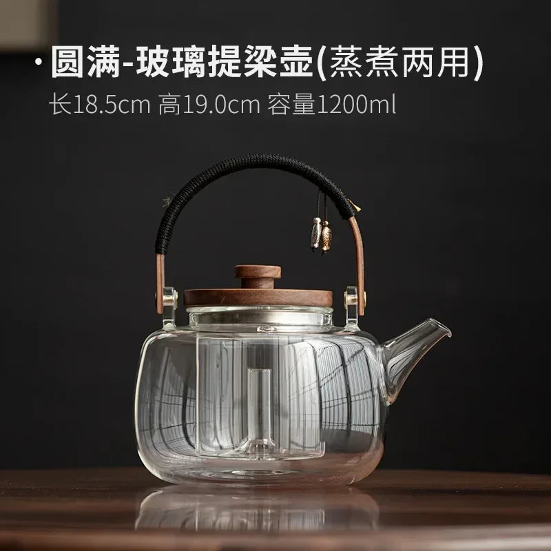 Small Glass Kettle Tea Set with Steaming Teapot and Electric Clay Stove