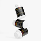 sea moss supplement capsules on wooden breakfast table with fruit juice coffee and granola for daily wellness routine