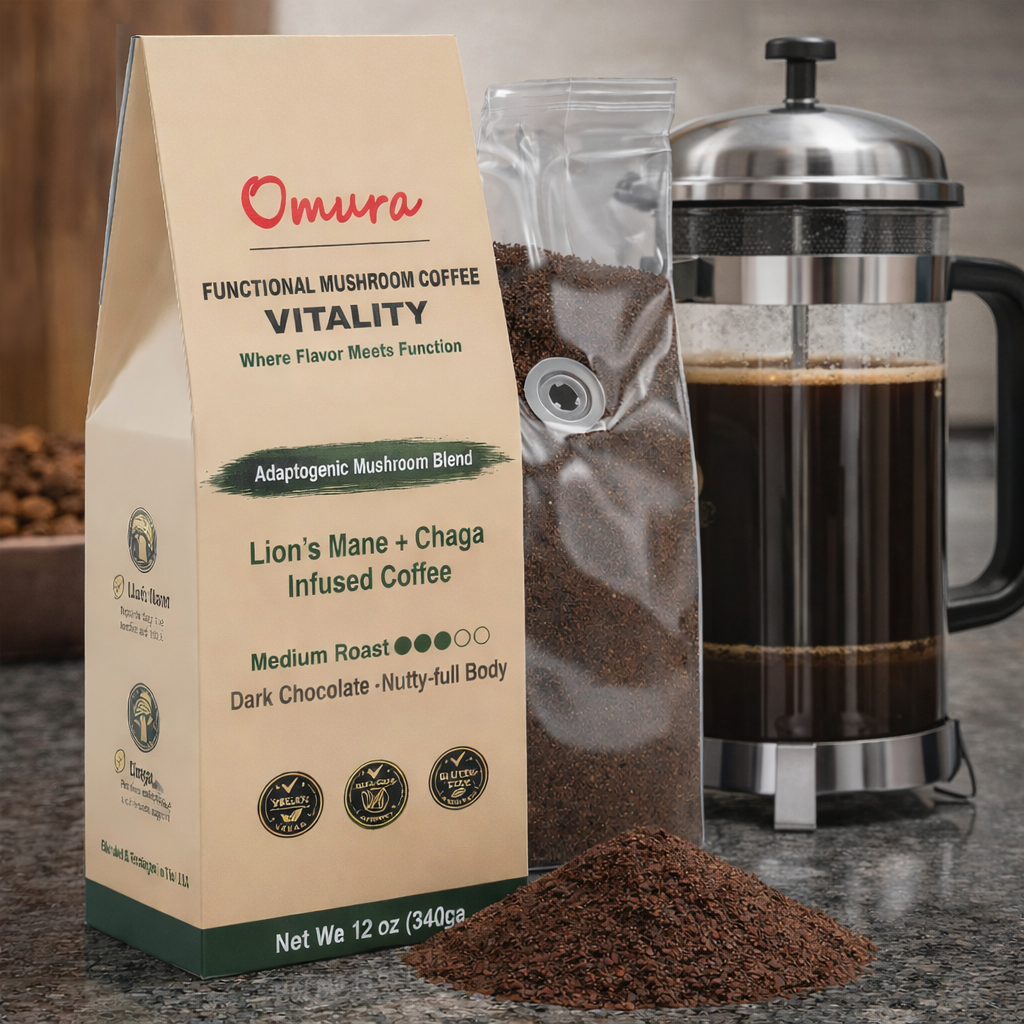 Omura Vitality mushroom coffee with Lion’s Mane and Chaga next to a French press, medium roast ground coffee on kitchen table